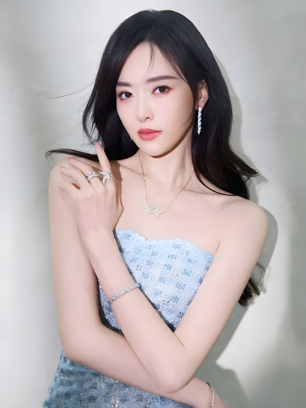 Tang Yan Embraces Ice-Blue Muse Aura in Sequin-Embellished Gown