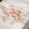 Women-Hanfu-Hairpin-with-Vintage-Lily-of-the-Valley-Flower-and-Tassel-Accents-1 Women Hanfu Hairpin with Vintage Lily-of-the-Valley Flower and Tassel Accents