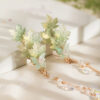 Maple-Leaf-Inspired-Traditional-Hairpins-Hanfu-Tassel-Clips-and-Qipao-Outfit-Combinations-1 Maple Leaf-Inspired Traditional Hairpins Hanfu Tassel Clips and Qipao Outfit Combinations